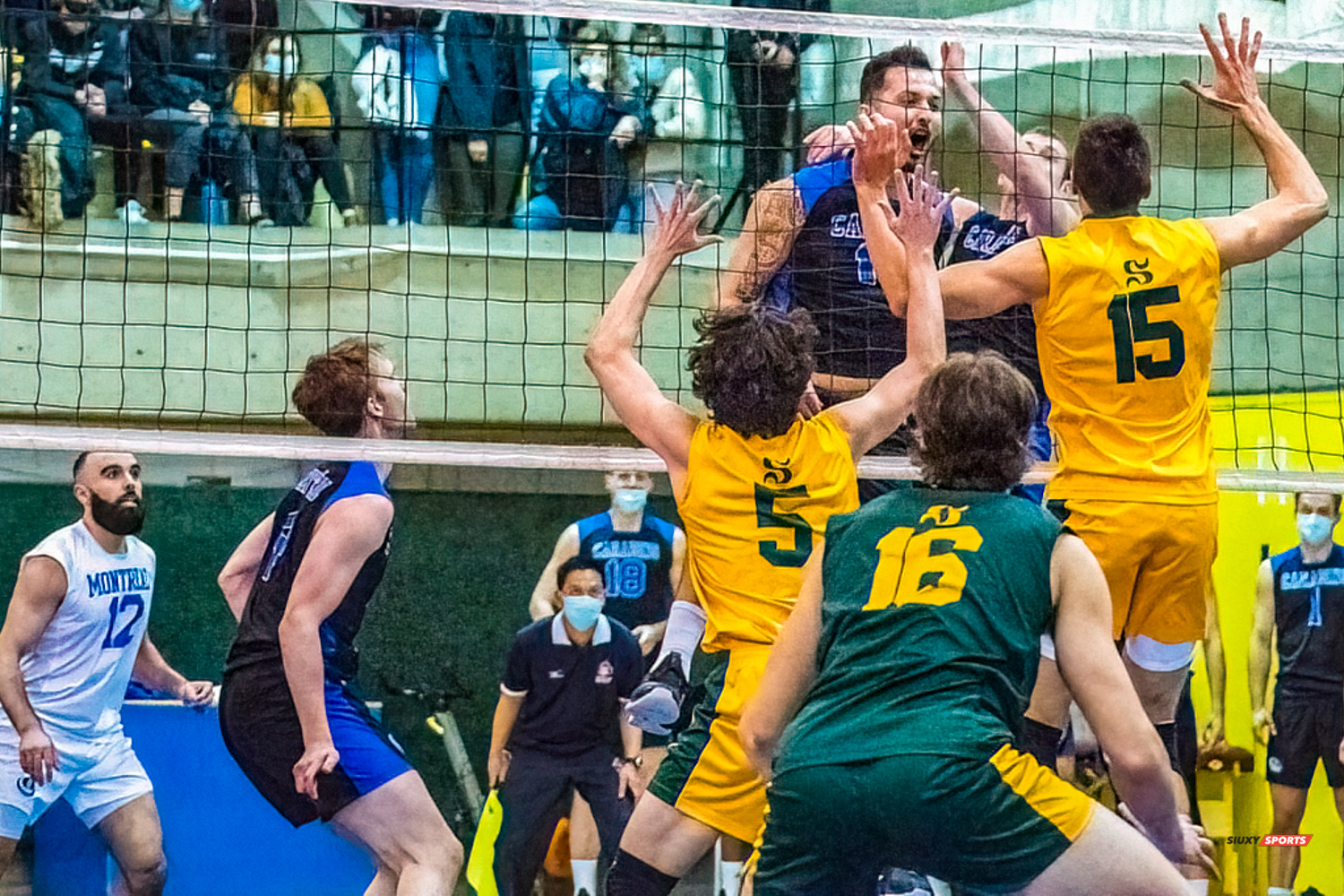 Zachary HOLLANDS - Nidhal RIDENE - Guillaume RIVEST - Alexis TOURNIER - Raphaël VIENS -  Université de Montréal - Université de Sherbrooke - Volleyball - Université de Sherbrooke (3) vs Université de Montréal (1) - Final 1 2022 (#VertOrVsCarabinsFinal1M) Photo by:  | Siuxy Sports 2022-03-19