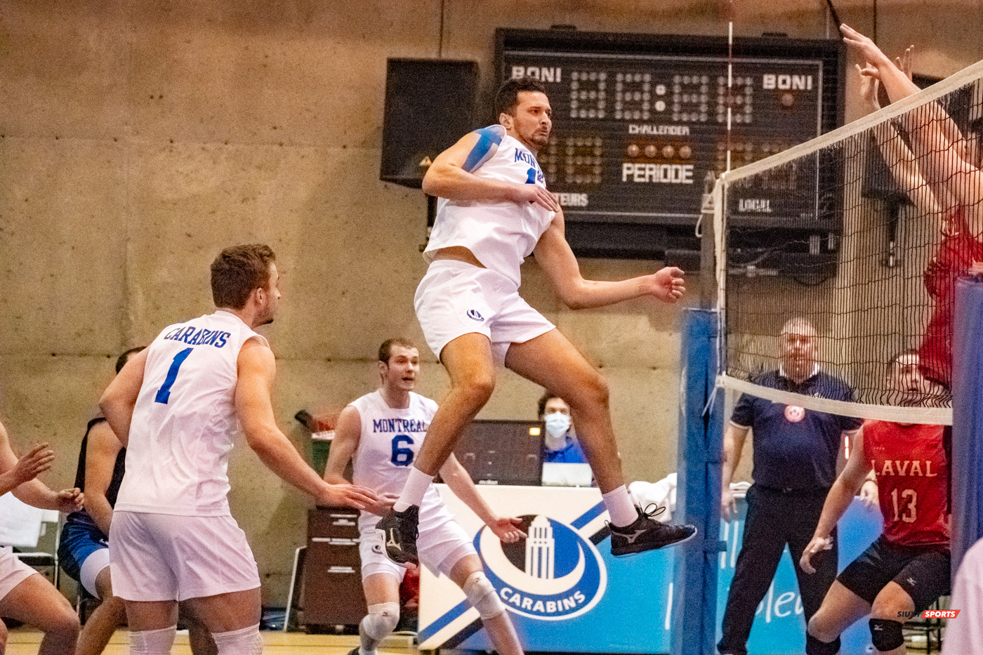 Nidhal RIDENE - Maxime ST-DENIS - Alexis TOURNIER -  Université de Montréal - Université Laval - Volleyball - Université de Montréal (3) vs Université Laval (2) (#CarabinsVsRgeOr2022VolleyM) Photo by:  | Siuxy Sports 2022-03-05