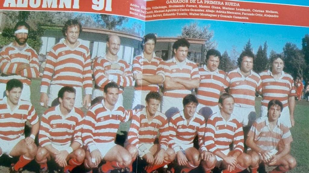 Manuel AGUIRRE - Gonzalo CAMARDON - Manuel DEL CARRIL - Normando FERRARI - Marcos GIANA - Carlos GONZALEZ - Mariano LOMBARDI - Christian MELHEM - Adrian MESZAROS - Walter MONTAGNER - Facundo ORTIZ - Sebastian SALVAT - Alejandro SCOLNI - Eduardo TORELLO - Rodolfo VILLALONGA -  Asociación Alumni -  - Rugby - Ganador de la primera rueda (1991) () Photo by:  | Siuxy Sports 1991-07-20